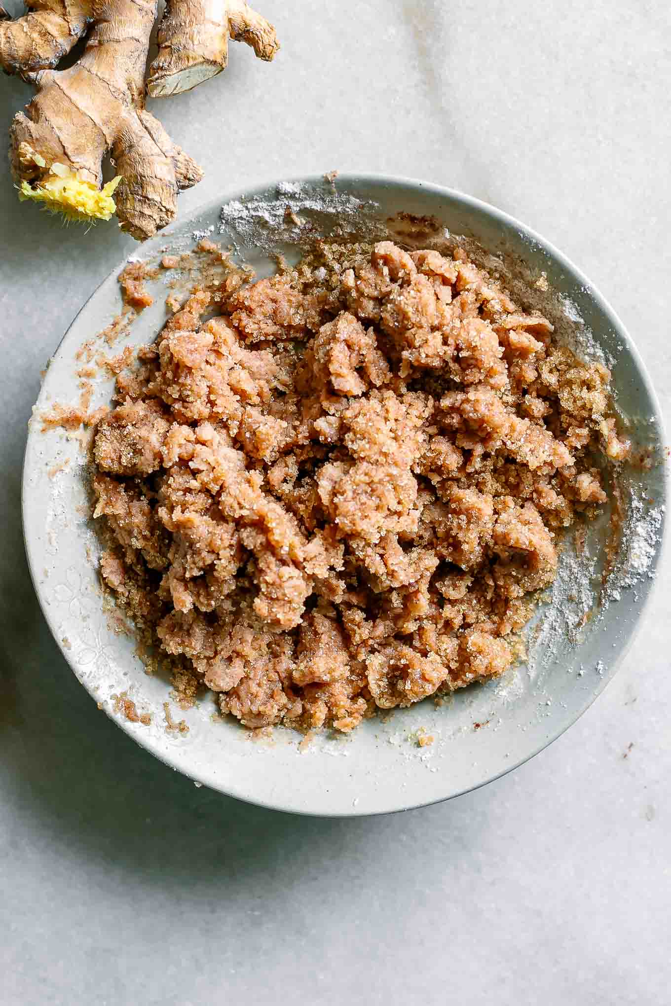 ginger and brown sugar crumble in a white bowl