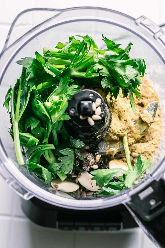 celery leaves, cheese, garlic, oil, salt, pepper in a food processor