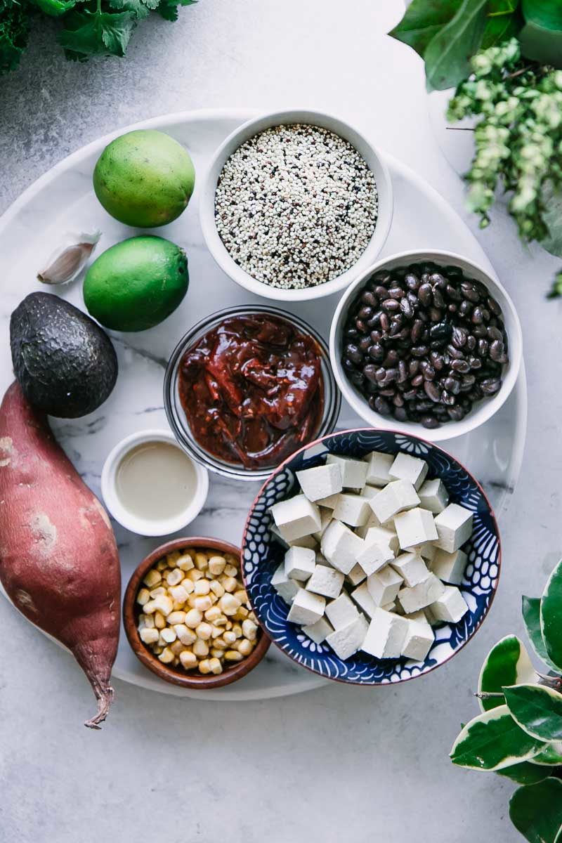 bowls of quinoa, black beans, cubed tofu, 