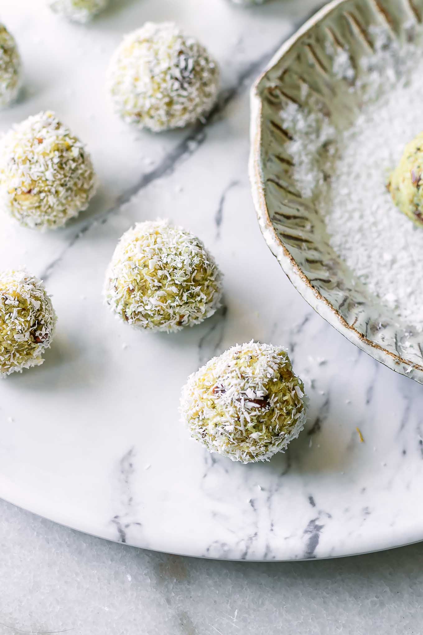 coconut lemon balls on a white table