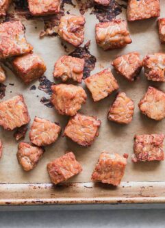 crispy tempeh on a sheet pan after baking