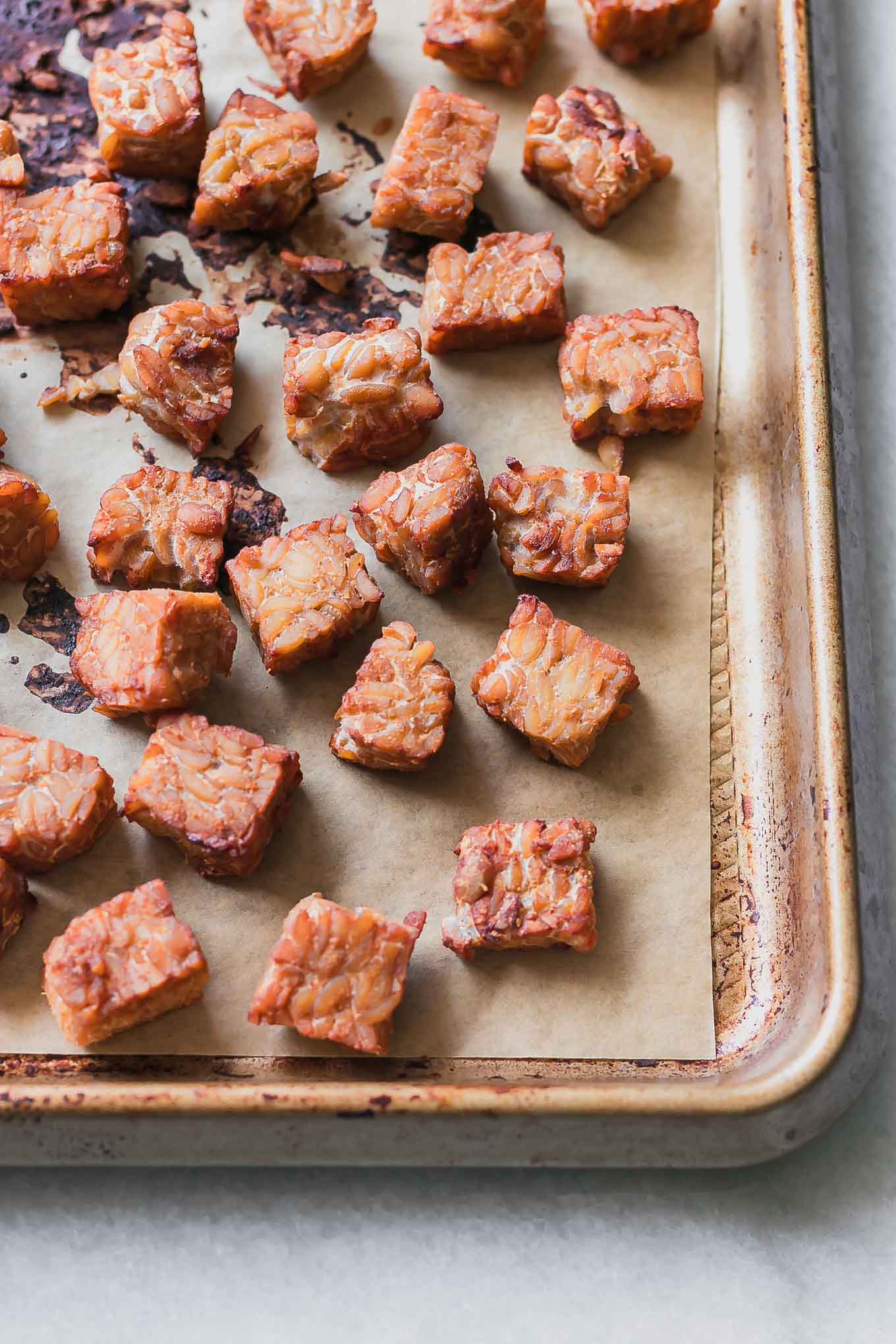 roasted tempeh on a sheet pan after baking