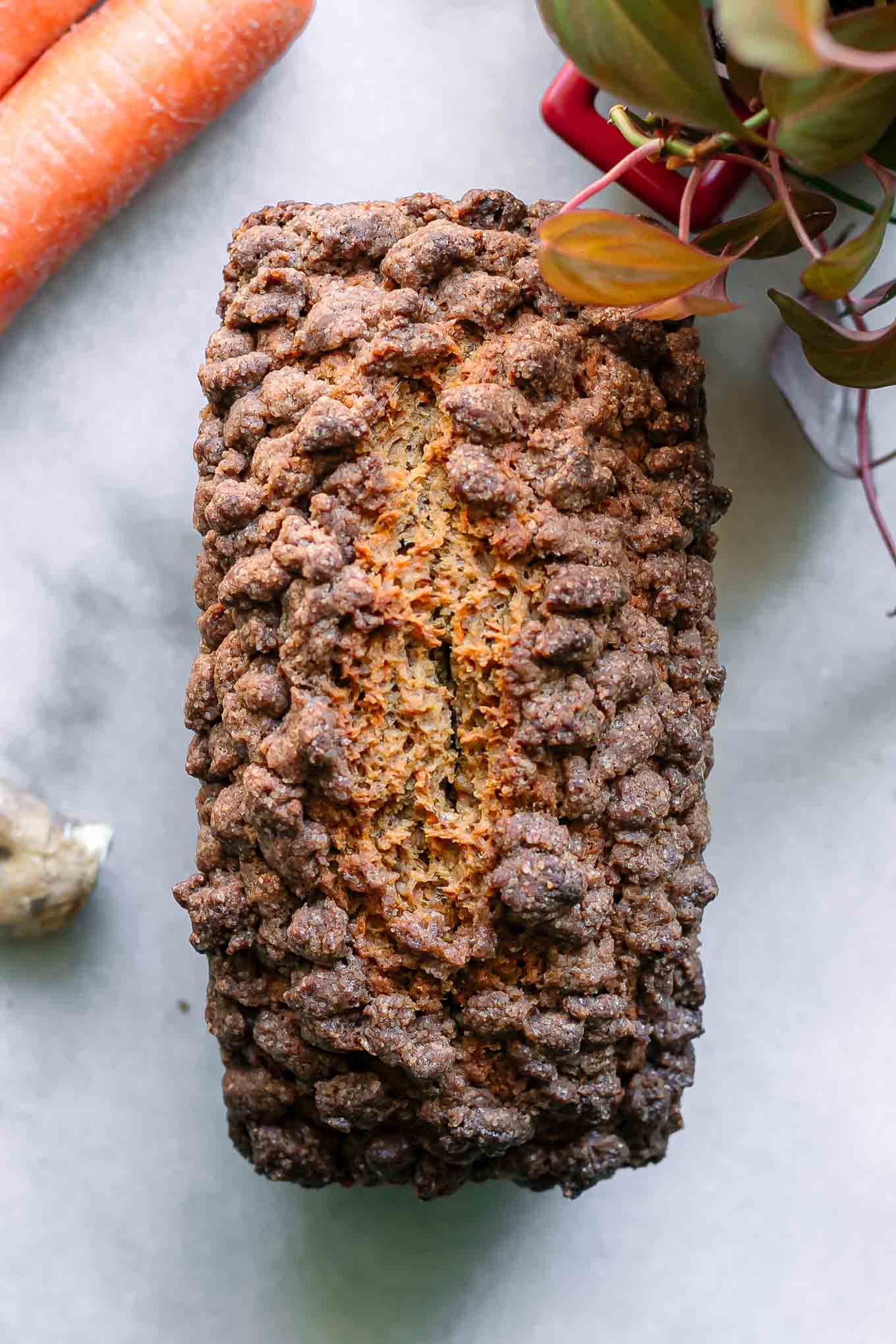 carrot cake bread cooling on a white table