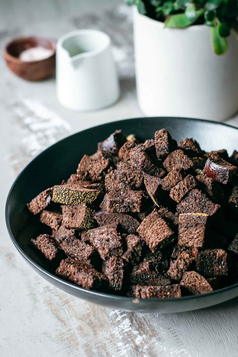 bowl filled with fresh homemade pumpernickel croutons