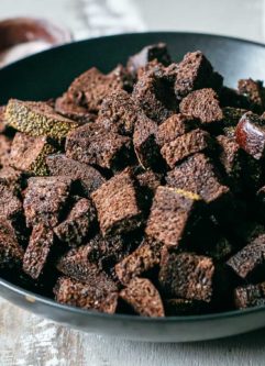 bowl of pumpernickel croutons on a counter