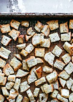 rye bread croutons on a baking sheet