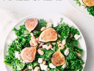 A green kale and fig salad on a white plate with the words "maple fig and beet kale salad" in black and pink writing.