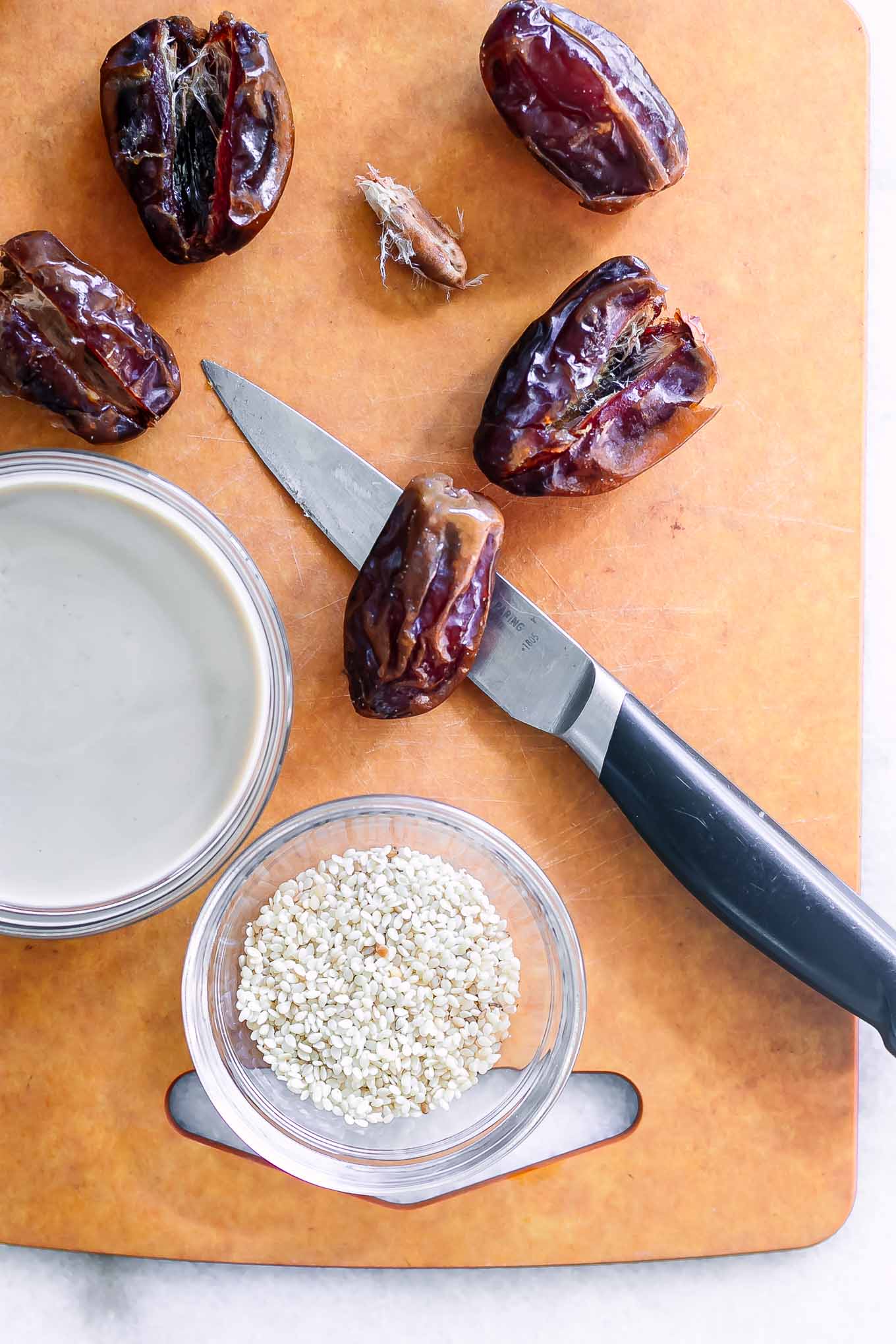 cut dates on a wood cutting board