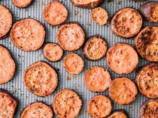 slides of roasted sweet potato on a sheet pan