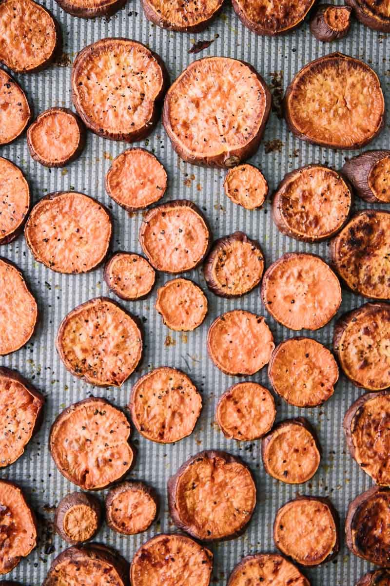 slides of roasted sweet potato on a sheet pan