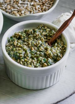 sunflower seed pesto in a white bowl