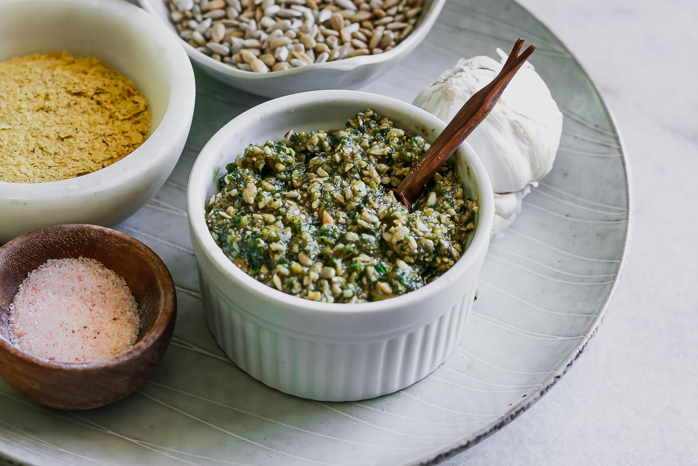 sunflower seed pesto in a white bowl