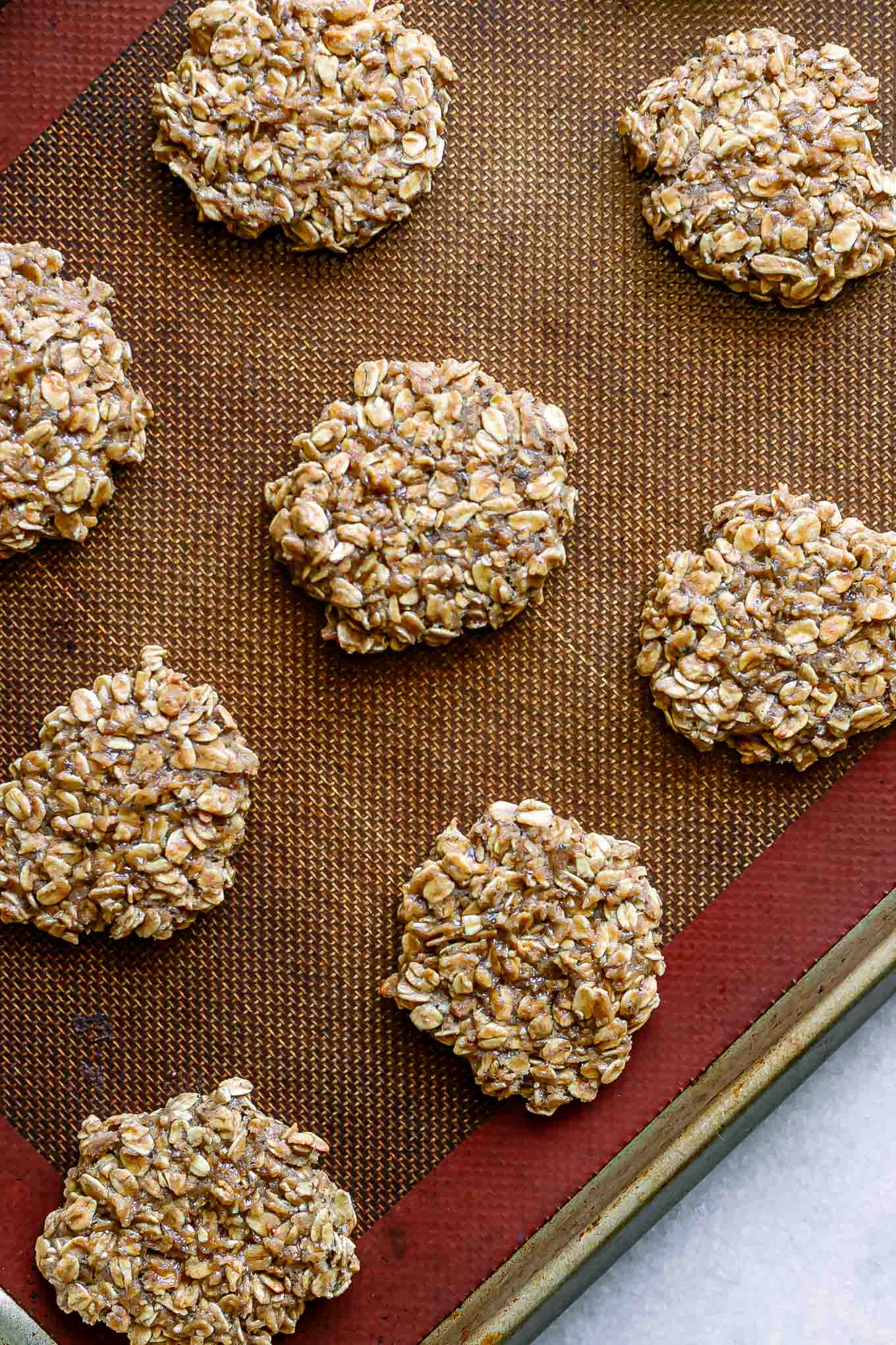 baked banana oatmeal cookies on a baking sheet