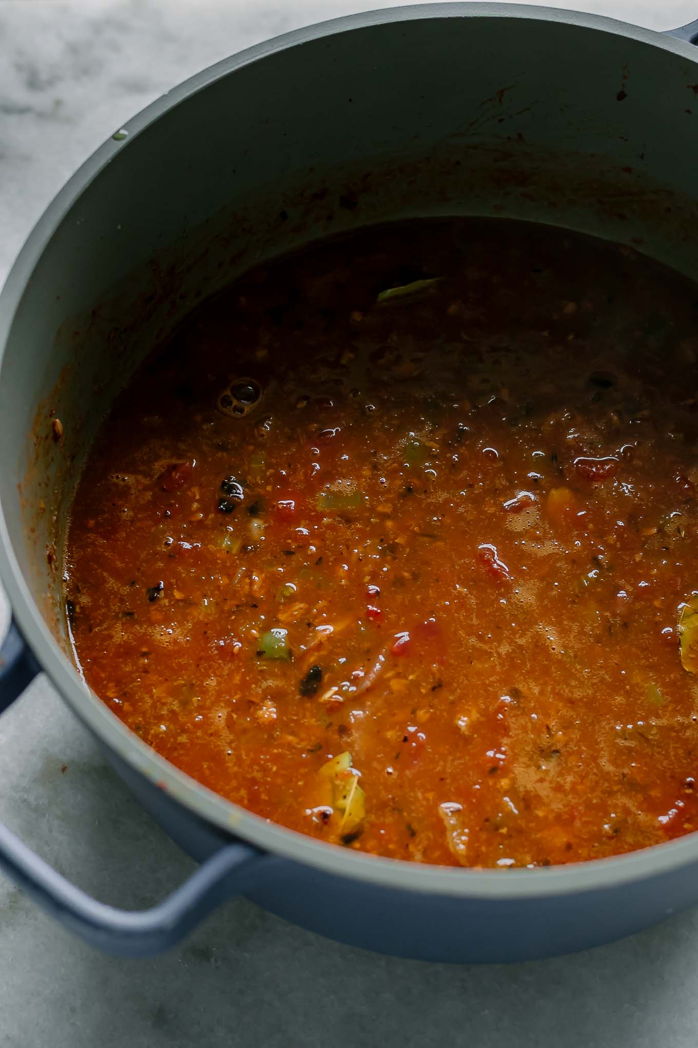 jambalaya in a pot before adding the rice